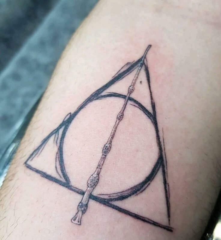 The Deathly Hallows Tattoo: A Symbol of Power, Legacy, and Sacrifice You Didn’t Know!